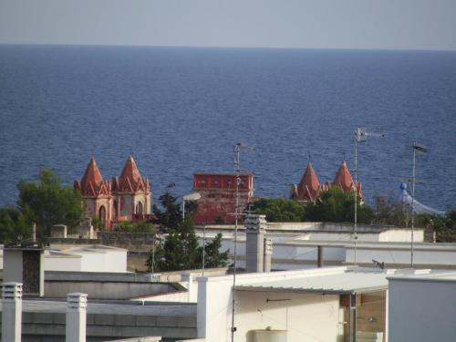 a view of the ocean from the roof of a building at Panoramici Monolocali in Leuca