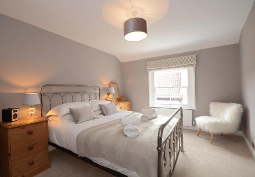 Ένα ή περισσότερα κρεβάτια σε δωμάτιο στο Fossgate Luxury Duplex City Centre Apartment with Free Parking