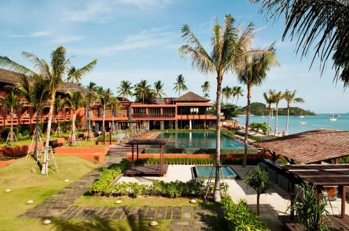 an aerial view of a resort with a swimming pool at Hansar Samui Resort & Spa - SHA Extra Plus in Bophut 