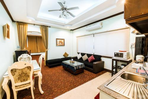 Prostor za sedenje u objektu Excellency Apartment