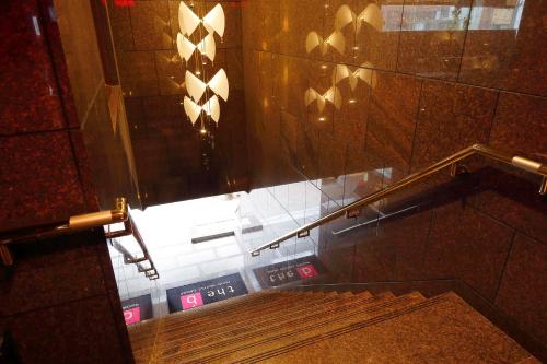 a view from the inside of a room with a wooden floor at the b sangenjaya in Tokyo