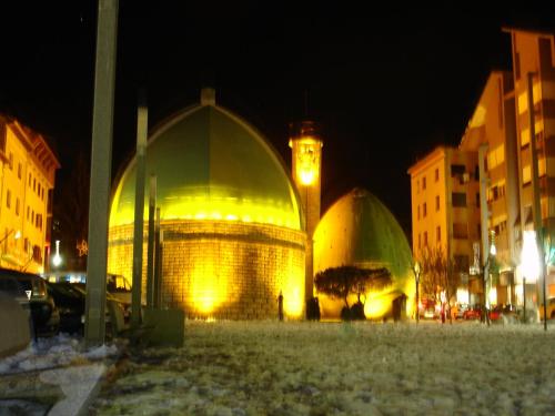 two large domes in a city at night at El Pedrís in El Pont de Suert