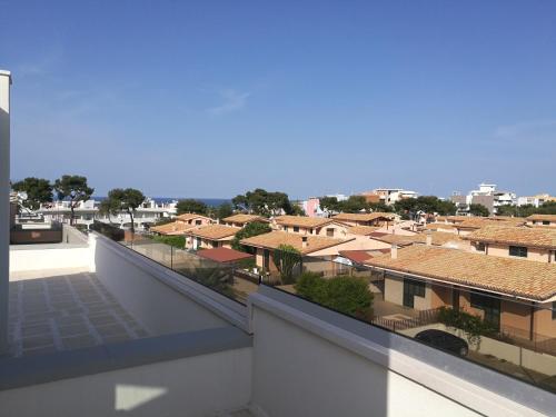 a view of a city from the balcony of a building at Manolo Case Vacanza in Monopoli