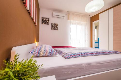 A bed or beds in a room at Il Muretto