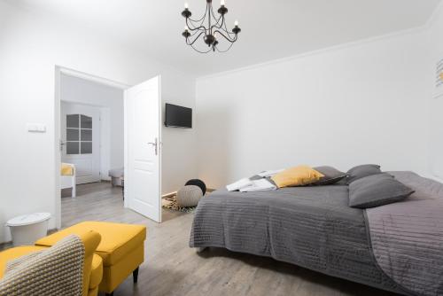Postel nebo postele na pokoji v ubytování Hotel Pošta