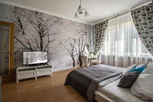 TV a/nebo společenská místnost v ubytování Design Apartment by Ruterra