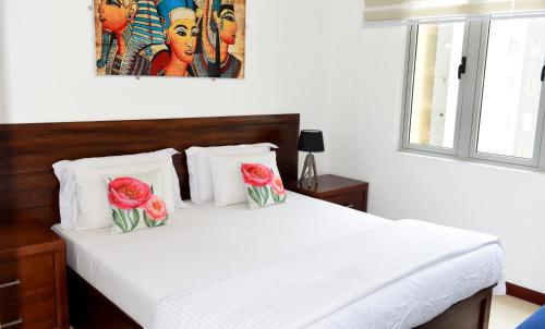 Cama o camas de una habitación en SkyLounge Apartment 2 Colombo