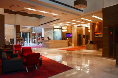 Posezení v ubytování Radisson Blu Hotel, Greater Noida
