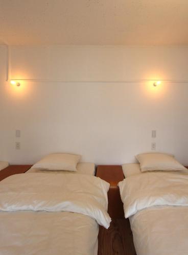 Cama o camas de una habitación en 2no HOME & PARK