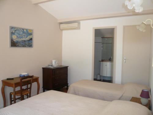 Ένα ή περισσότερα κρεβάτια σε δωμάτιο στο Chambres d'hôtes de la gardy