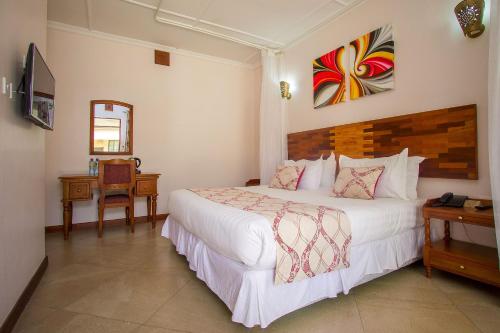 Ένα ή περισσότερα κρεβάτια σε δωμάτιο στο The Smith Hotel