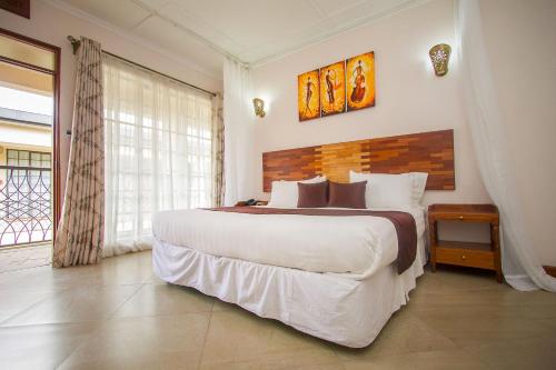 Ένα ή περισσότερα κρεβάτια σε δωμάτιο στο The Smith Hotel