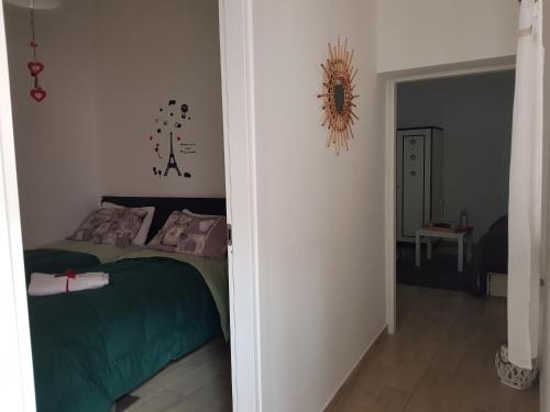 Postel nebo postele na pokoji v ubytování La casetta di Jasmine