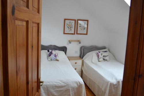 Postel nebo postele na pokoji v ubytování Oban Seil Farm