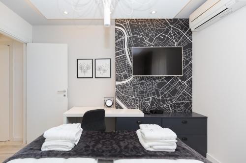 Classy Design Accommodation tesisinde bir odada yatak veya yataklar