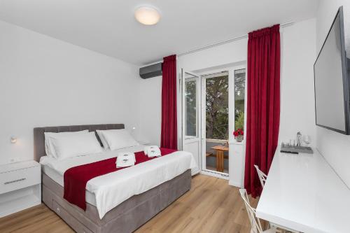 Postel nebo postele na pokoji v ubytování Luxury Rooms Paradise Garden