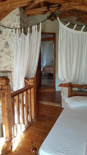 Posteľ alebo postele v izbe v ubytovaní Castello Bellos Villas