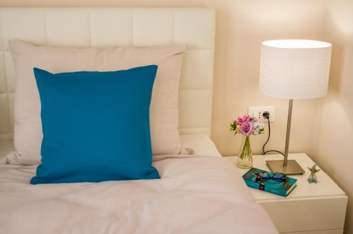 Postel nebo postele na pokoji v ubytování Luxury Apartment GOLDY
