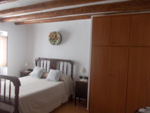 Ліжко або ліжка в номері Casa de pueblo Godall