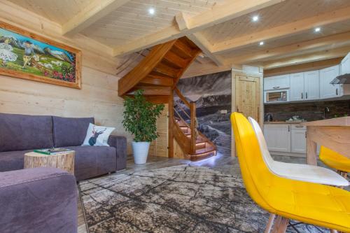 Et opholdsområde på Domek z widokiem-Deluxe Cottage with a View Deluxe-Zakopane