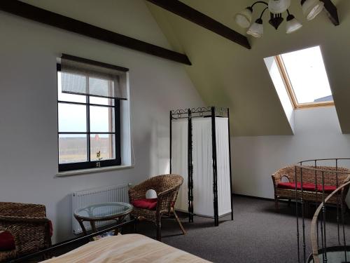 a bedroom with two bunk beds and a window at Villa Traku Terasa in Trakai
