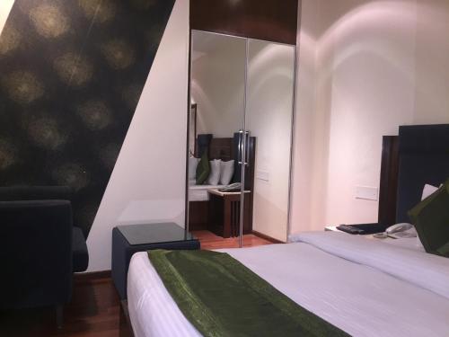 Cama o camas de una habitación en Hotel Aura - New Delhi Railway Station