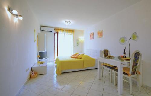 Postel nebo postele na pokoji v ubytování Apartment Rosana