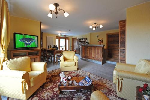 TV a/nebo společenská místnost v ubytování Gresil Residence