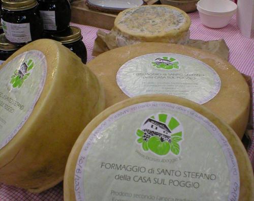 three slices of cheese on a table with labels at Agriturismo La Casa sul Poggio in Santo Stefano dʼAveto