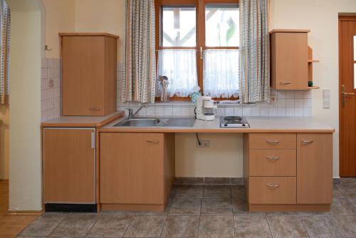 Kuchyň nebo kuchyňský kout v ubytování Bauernhof Flucher-Plaschg