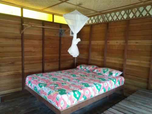 Postel nebo postele na pokoji v ubytování Jansom Bungalow 2