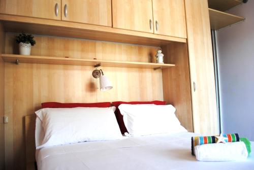 Ένα ή περισσότερα κρεβάτια σε δωμάτιο στο Bnbook - Ferrarin Apartment
