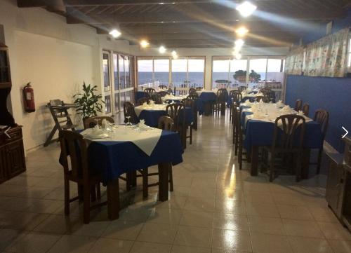 A restaurant or other place to eat at Residencias Varadouro