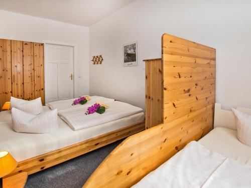 Кровать или кровати в номере Strandvilla Imperator