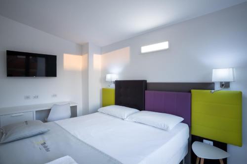 Cama o camas de una habitación en TH collection rooms