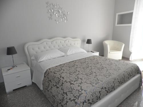 A bed or beds in a room at Piazza degli Angeli