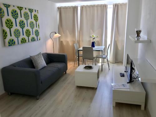 Ruang duduk di Apartamentos Bruja