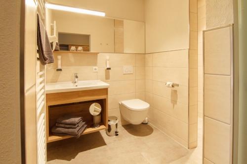 Ванна кімната в Hotel-Gasthof Neue Post