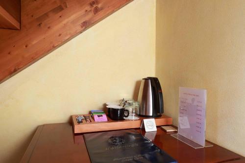 Kemudahan buat kopi dan teh di Locanda Il Maestrale
