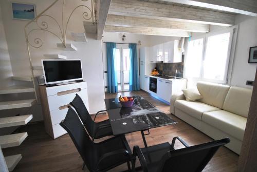 Kuchyň nebo kuchyňský kout v ubytování Holiday Residence Rifugio