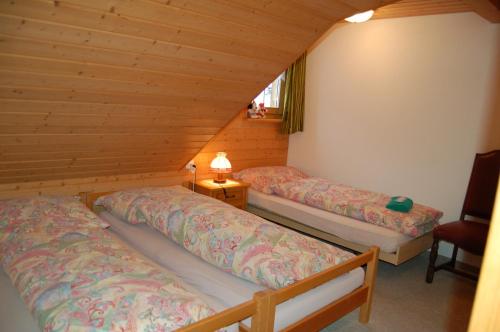 Postel nebo postele na pokoji v ubytování Gasthaus Schäfli