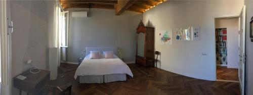 Postel nebo postele na pokoji v ubytování B&B L'Affresco