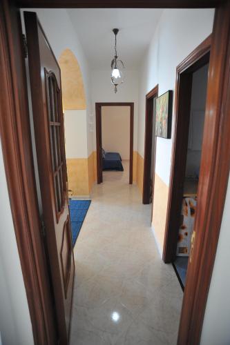 Ένα ή περισσότερα κρεβάτια σε δωμάτιο στο Casa Luisa & Milu , Coastal Retreats in Furore!