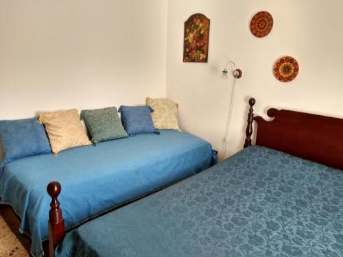 Ένα ή περισσότερα κρεβάτια σε δωμάτιο στο Heart of Castellammare