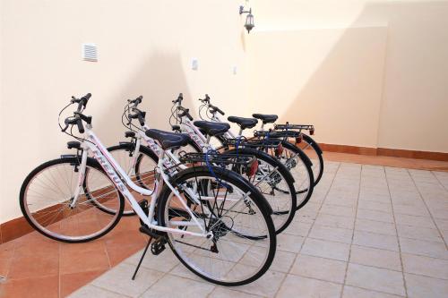 a row of bikes parked in a room at Andolfi 24 Rooms in Pompei