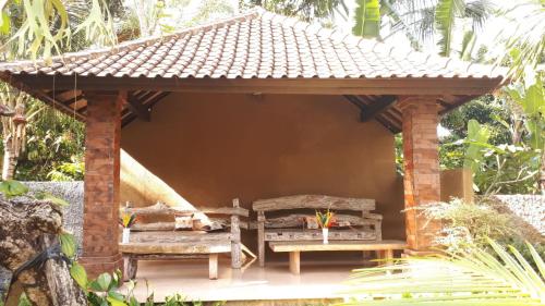 Fotografie z fotogalerie ubytování Tangkas House v destinaci Tampaksiring