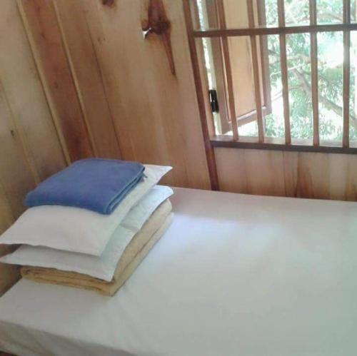 Postel nebo postele na pokoji v ubytování Tran Xuan Homestay