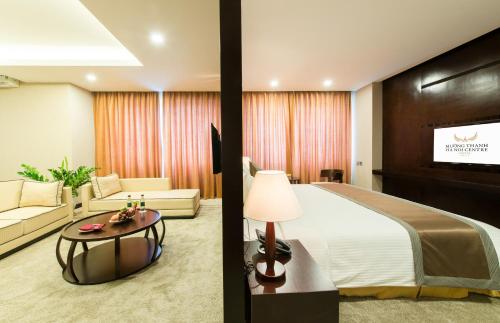 a hotel room with a bed and a tv at Muong Thanh Hanoi Centre Hotel in Hanoi