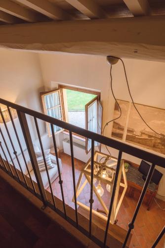 an overhead view of a room with a table and two windows at Villa Aia Vecchia in Bibbona
