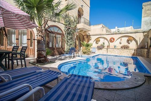 Piscina en o cerca de Ta' Nina Holiday Farmhouse with Private Pool in Island of Gozo